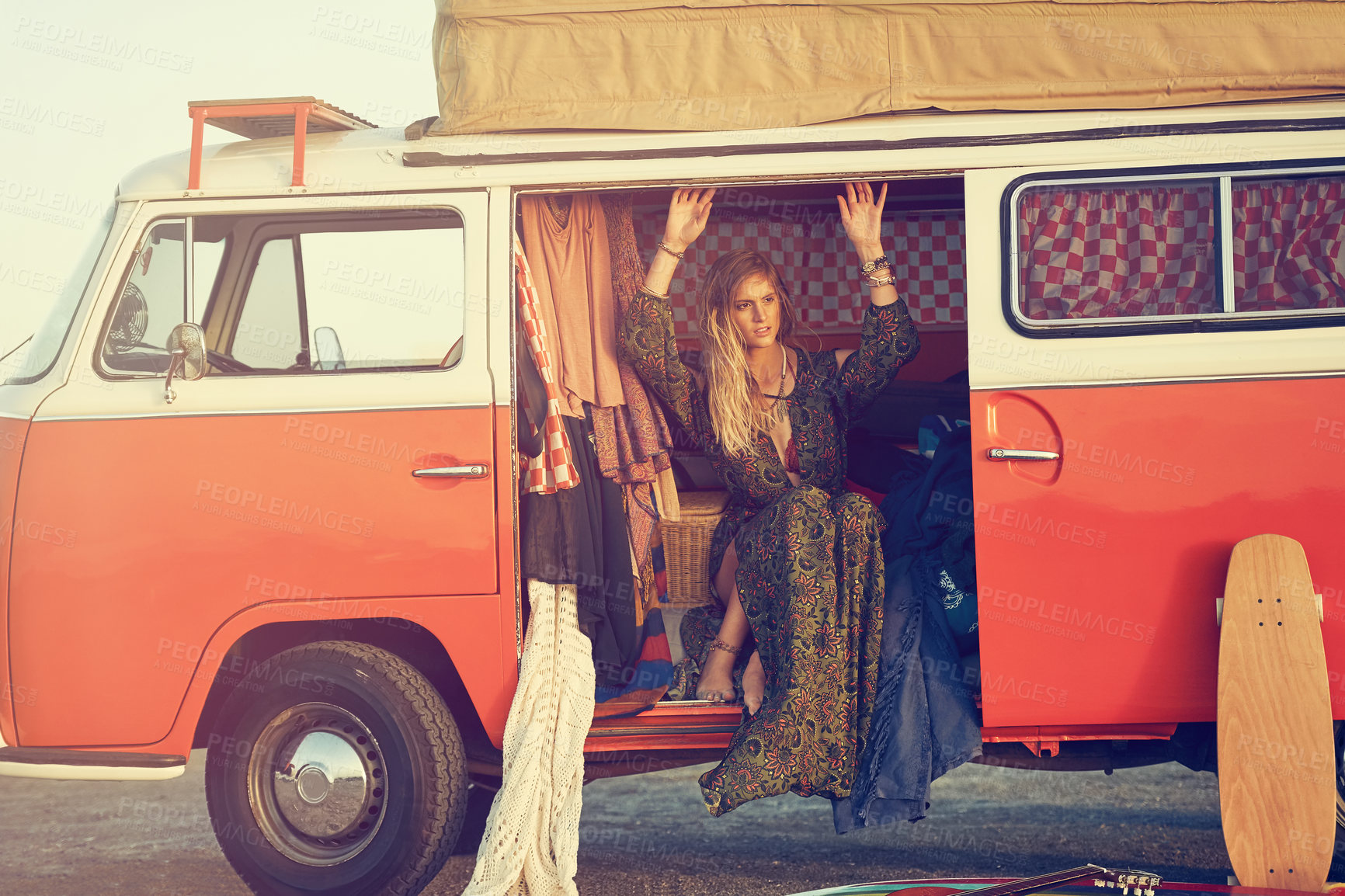 Buy stock photo Shot of a gorgeous young woman enjoying a roadtrip on her own