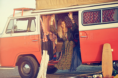 Buy stock photo Shot of a gorgeous young woman enjoying a roadtrip on her own