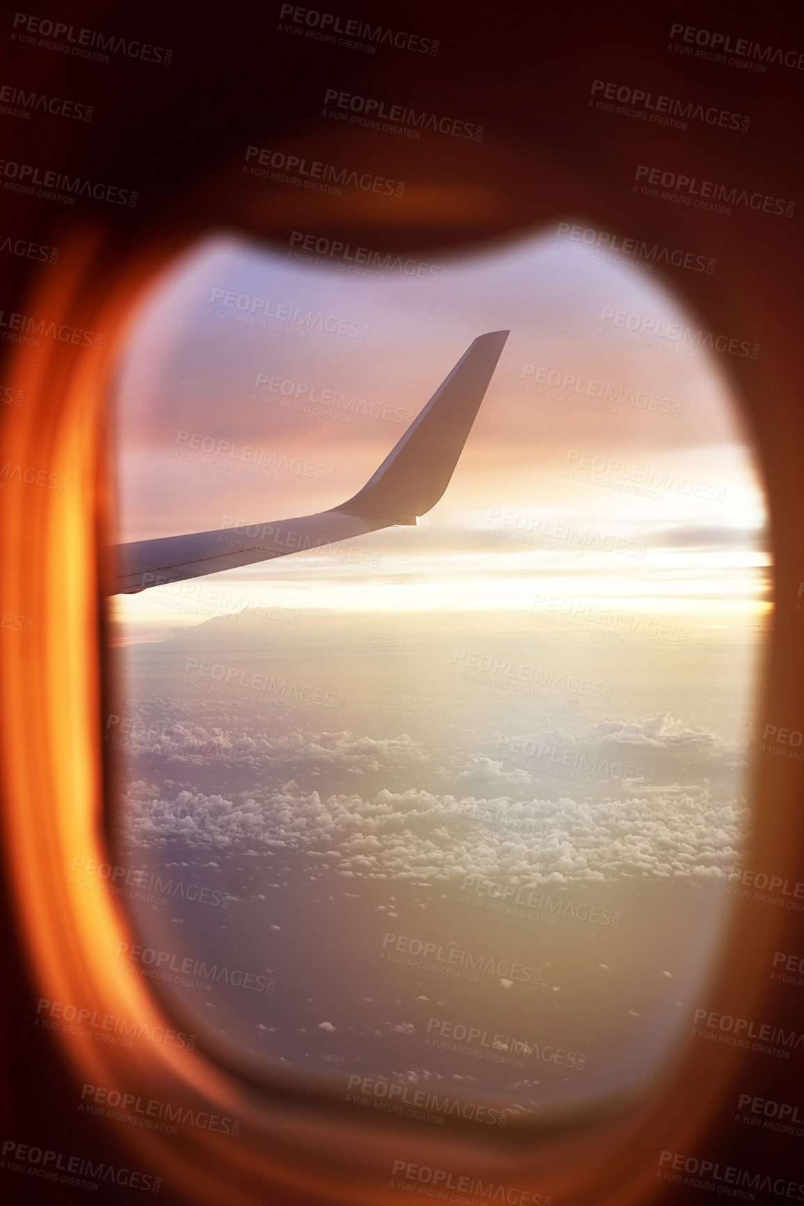 Buy stock photo Shot of the view through an airplane window