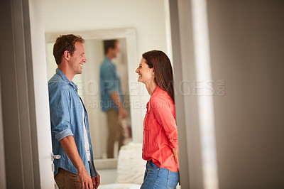 Buy stock photo Shot of an affectionate mature couple bonding together at home