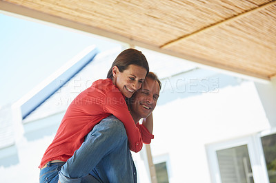 Buy stock photo Shot of a mature couple enjoying the day outside together