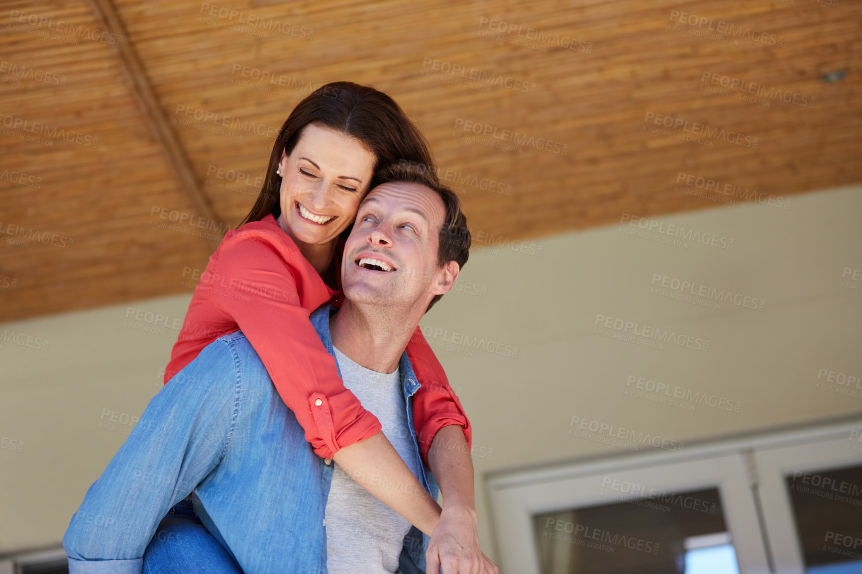 Buy stock photo Shot of a mature couple enjoying the day at home together