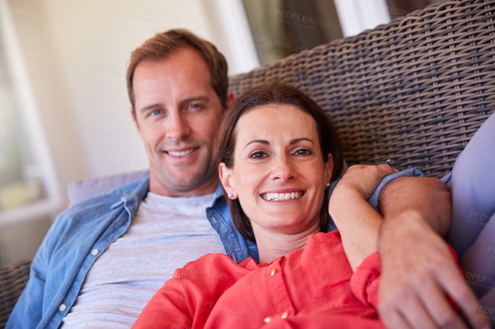 Buy stock photo Portrait of a mature couple relaxing together at home