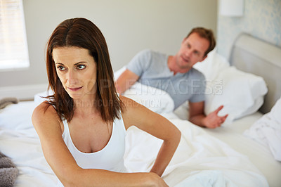 Buy stock photo Shot of a mature couple having marital problems at home