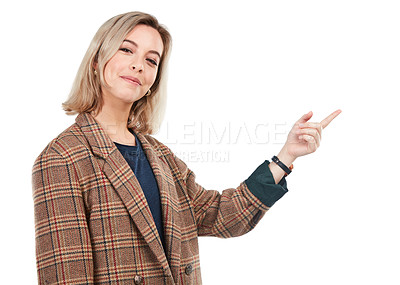 Buy stock photo Portrait, brand and smiling woman pointing finger isolated against a studio white background. Happy, fashion and confident young female showing empty mock up space or direction to a promo