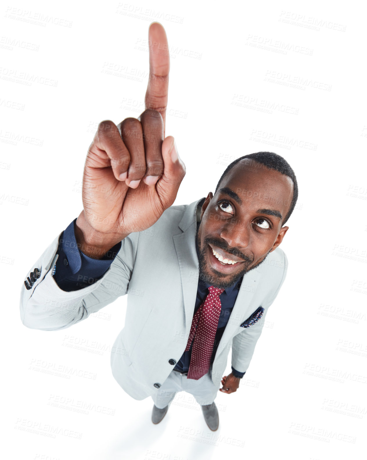 Buy stock photo High angle, businessman and pointing up on isolated white background, marketing space and advertising mockup. Smile, happy and corporate worker in creative pov with showing hands gesture on mock up