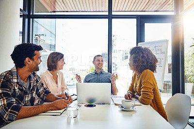 Buy stock photo Cropped shot of a team of designers having a meeting in an office