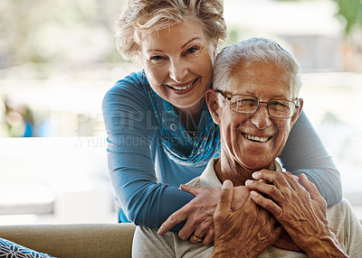 Buy stock photo Portrait of a happy couple bonding at home