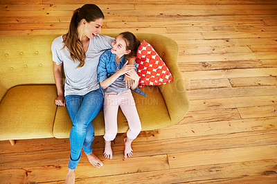 Buy stock photo Shot of a mother and her little daughter bonding together at home