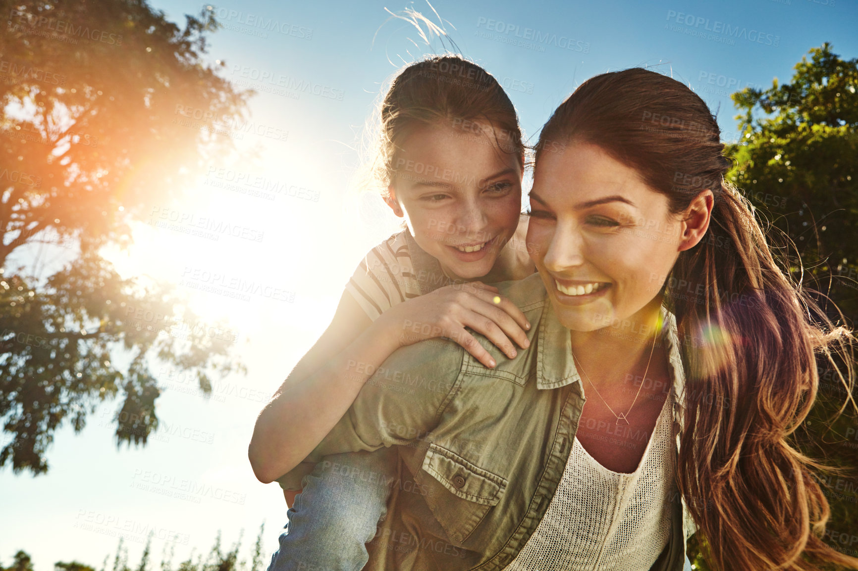 Buy stock photo Mother, girl and outdoor for piggy back with happiness, bonding on vacation in Australia. Female person, child and smile for learning or development in nature, cheerful in countryside with sunshine