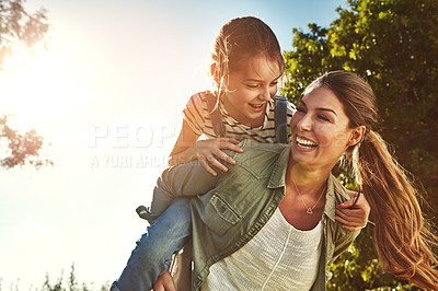Buy stock photo Piggyback, happy and a mother and child in nature for bonding, happiness and love in summer. Laughing, relax and a mom and a girl kid in a park or garden for playing together and quality time
