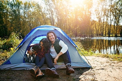 Buy stock photo Couple, dog and camping by tent in nature for adventure, freedom and vacation or peace. People, puppy and relax in woods or forest by lake for summer holiday, memory and outdoor experience at morning