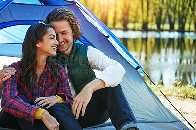 Buy stock photo Camping, couple and hug in tent with love and happiness together on adventure in woods at lake. People, embrace or relax outdoor in countryside with peace on vacation or travel to river in forest