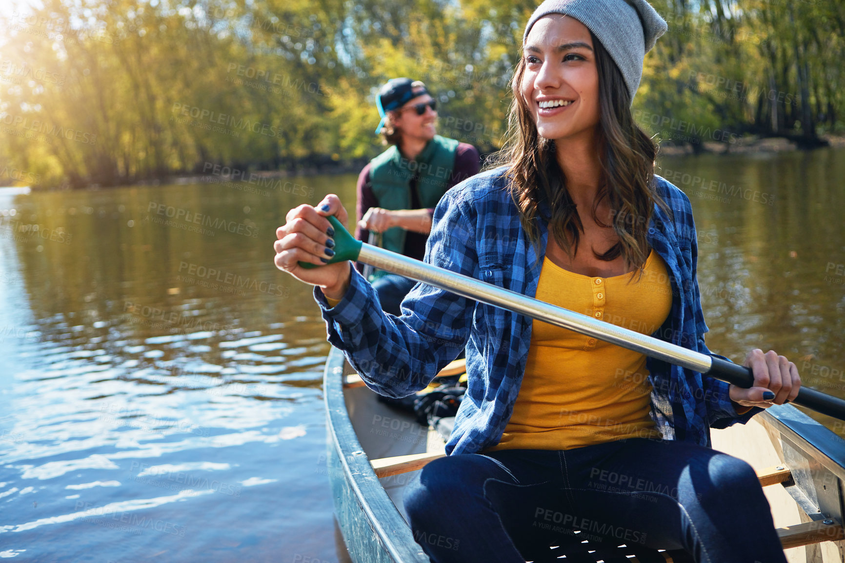 Buy stock photo Couple, canoeing and lake for outdoor holiday exploring or rowing adventure, environment or journey. Man, woman and travel weekend on river for Colorado vacation with forest exercise, island or hobby