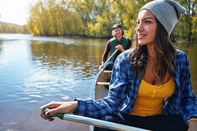 Buy stock photo Lake, canoe and couple with nature, happiness and hobby with vacation, bonding together and getaway trip. River, man and woman with activity, honeymoon and travel with adventure, journey and sunshine