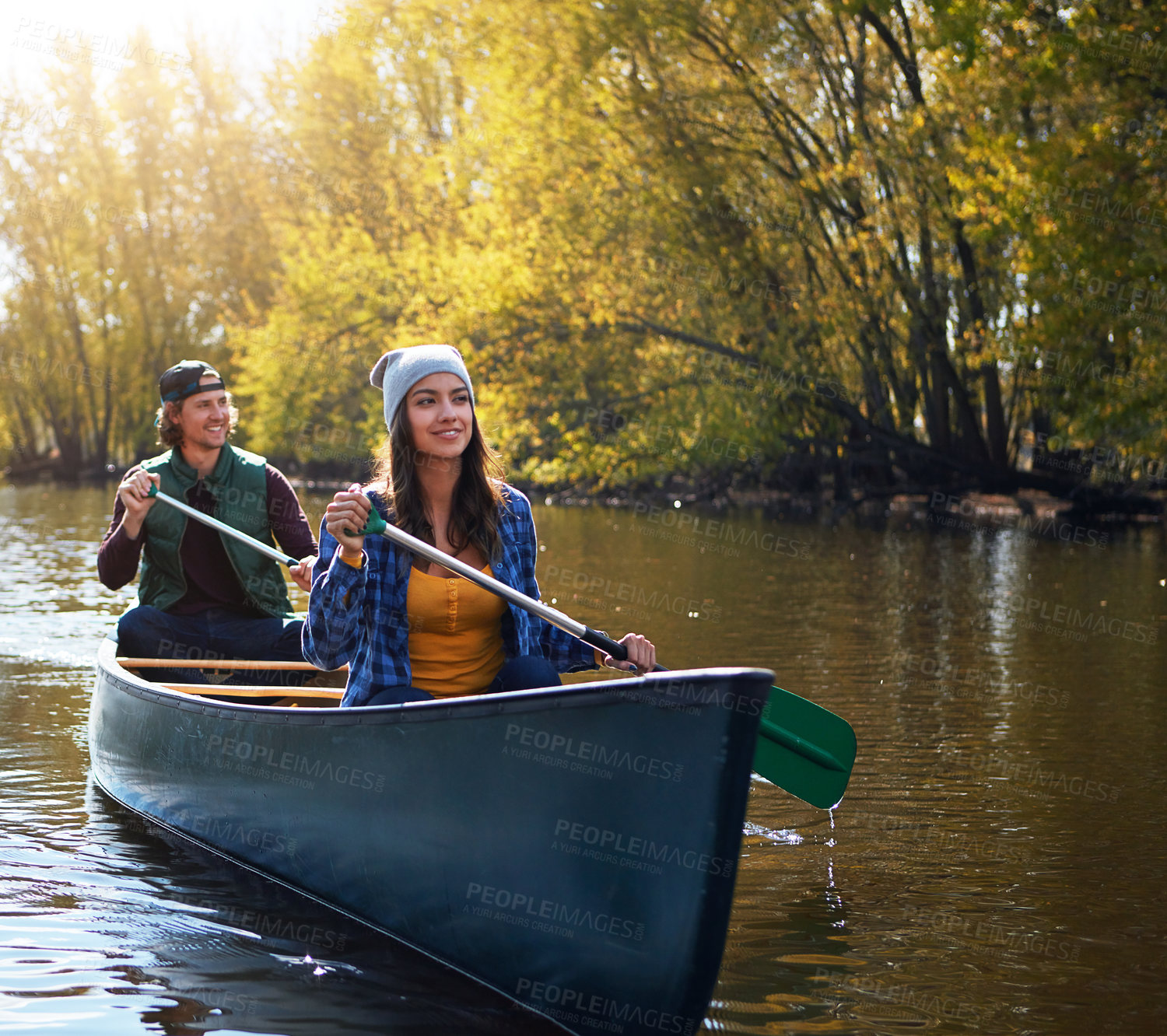 Buy stock photo Lake, canoe and couple with adventure, travel and hobby with vacation, happiness and summer. River, happy man and woman with activity, honeymoon and nature with paddle, journey and bonding together
