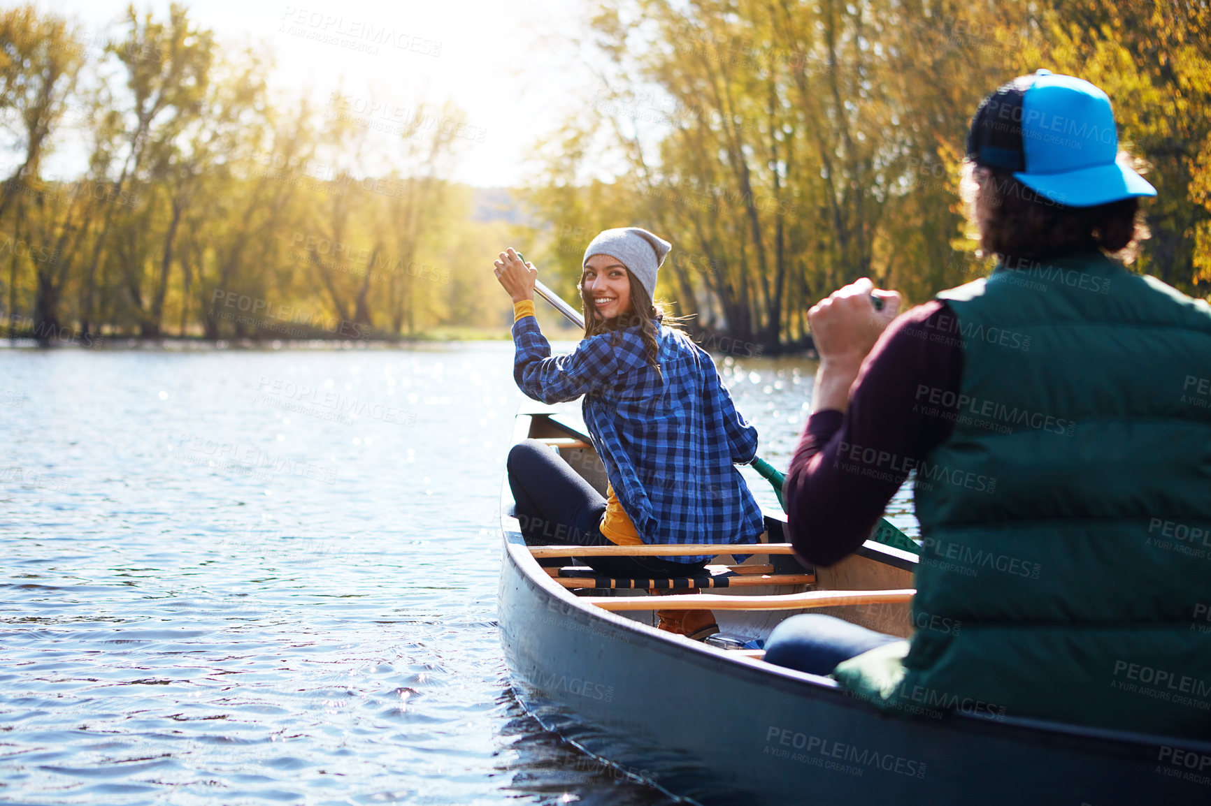 Buy stock photo Happy couple, canoe and lake with ride for holiday adventure, river trip or journey in nature. Woman, man or rowing boat together with smile for outdoor exploration, travel or sightseeing in water