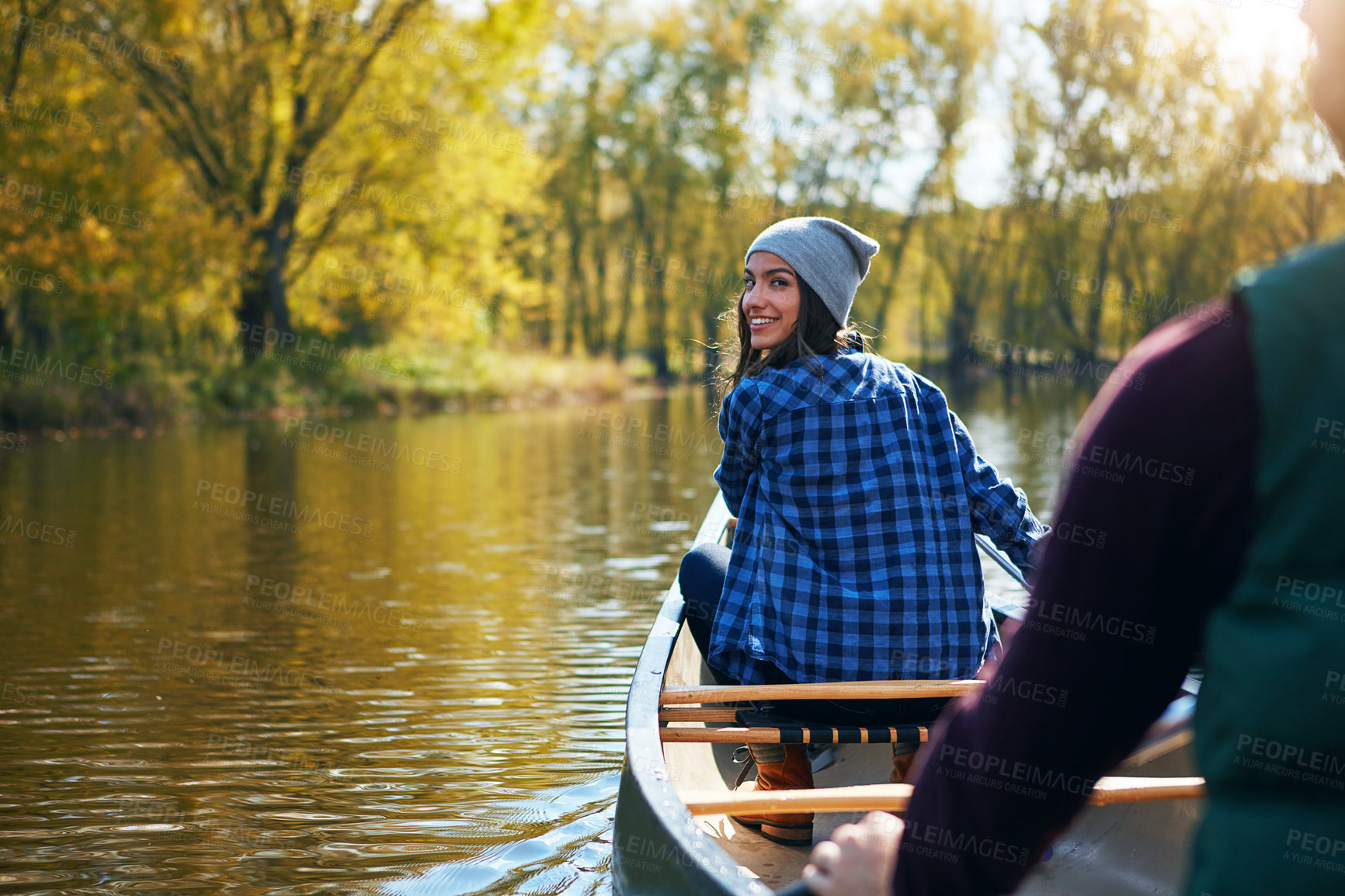 Buy stock photo Portrait of a young couple going for a canoe ride on the lake