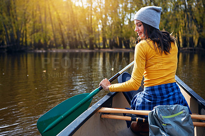 Buy stock photo Woman, back and canoeing in nature on water, wellness hobby and backpack for supplies with paddle for rowing. Vacation, relax and explore exercise on travel holiday, canoe boat and trees on river