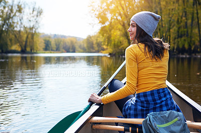 Buy stock photo Woman, back and canoeing in forest on water, wellness hobby and backpack for supplies with paddle for rowing. Vacation, relax and explore exercise on travel holiday, canoe boat and trees on river