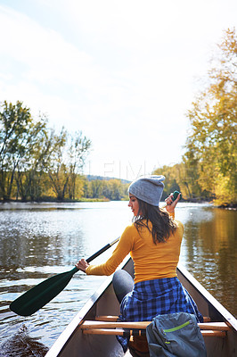 Buy stock photo Woman, back and canoe in forest on water, wellness hobby and backpack for supplies with paddle for rowing. Vacation, relax and explore exercise on travel holiday, canoeing boat and trees on river