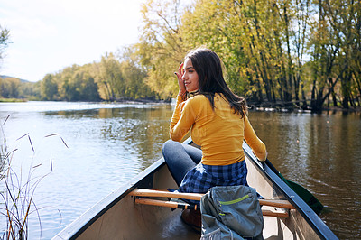 Buy stock photo Woman, back and canoeing in nature on water, wellness hobby and backpack for supplies with paddle for rowing. Vacation, relax and explore exercise on travel holiday, canoe boat and trees on river