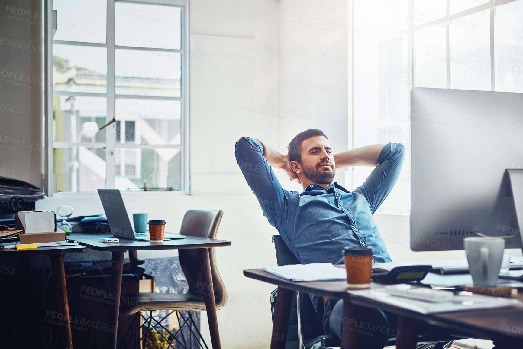 Buy stock photo Break, relax and business man at office desk for stretching, productivity or done with project. Smile, computer and employee with arms behind head for satisfied, achievement or deadline complete