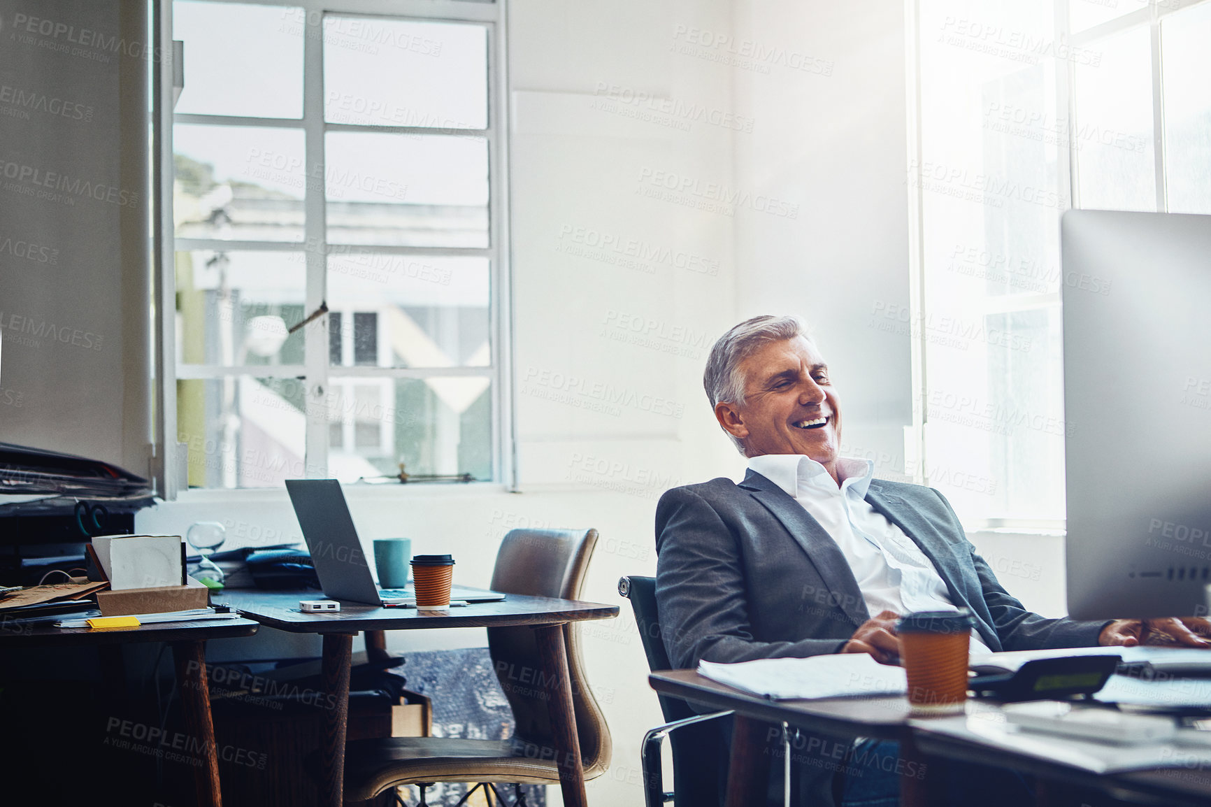 Buy stock photo Laugh, mature man and computer in office with financial report, documents or happy online. Accountant, smile and business person with tech for investment analysis, funny joke and portfolio management