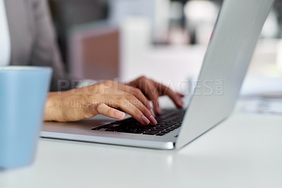 Buy stock photo Closeup shot of a businesswoman working on a laptop in an office