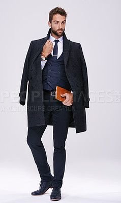 Buy stock photo Book, fashion and face of man with suit for style, elegance and formal wear isolated on white background. Male person, gentleman and businessman with trendy clothes, class and work outfit in studio