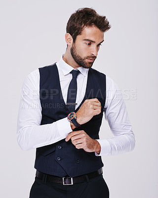 Buy stock photo Studio, confident and man in suit for fashion, stylish and luxury for aesthetic of glamour and classic. Adult, guy and male person in white background, tuxedo and professional for job and career