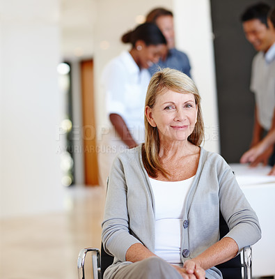 Buy stock photo Portrait, business person and woman in a wheelchair, startup and professional in a modern office. Lady with a disability or senior employee with workplace accessibility or inclusion with consultant