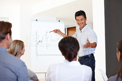 Buy stock photo Businessman, presentation and workshop for meeting, planning and teaching for collaboration. Asian man, teaching and happiness with white board, seminar and teamwork for project in office workplace