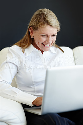 Buy stock photo Mature businesswoman, website and laptop on couch, planning and internet for b2b online communication. Female person, CEO and proud of startup company, finance and happy accountant for ideas on app