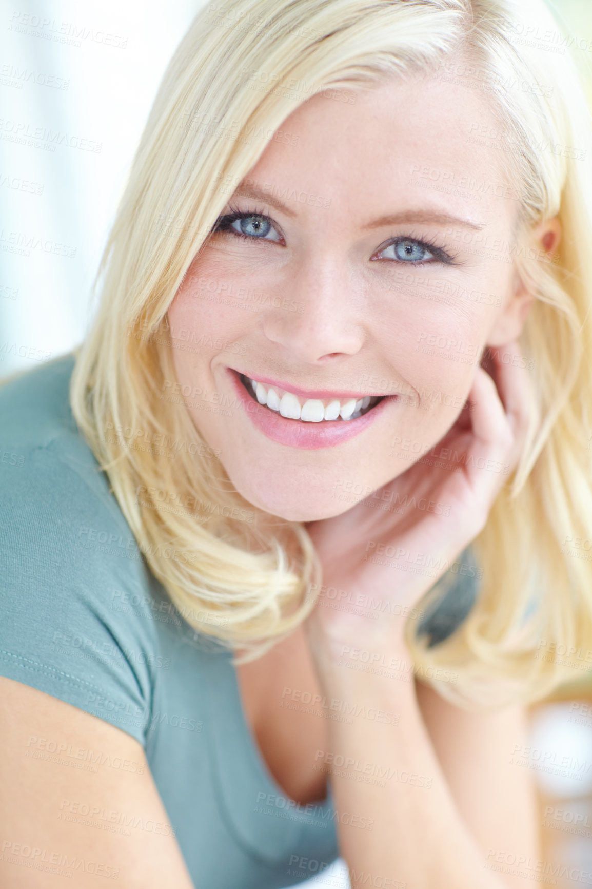 Buy stock photo Cropped portrait of a beautiful blonde woman smiling