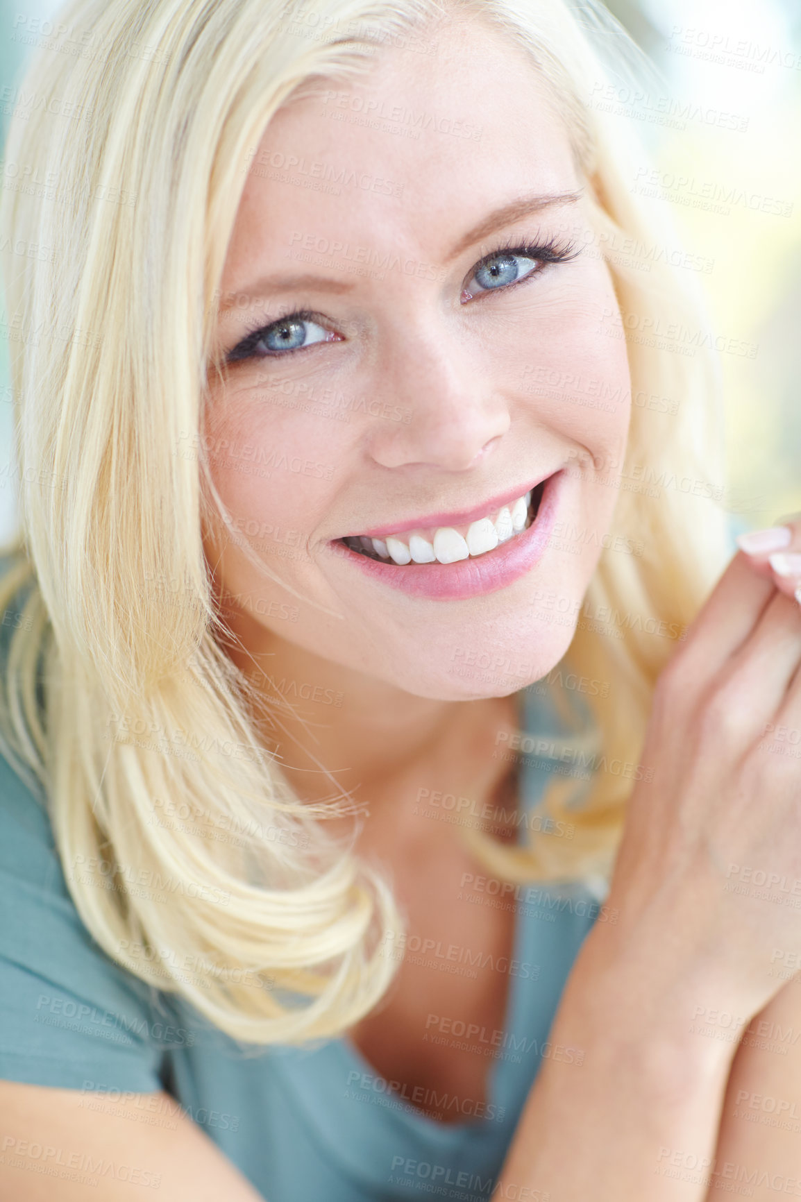 Buy stock photo Cropped portrait of a beautiful blonde woman smiling