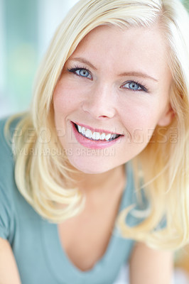 Buy stock photo Cropped portrait of a beautiful blonde woman smiling