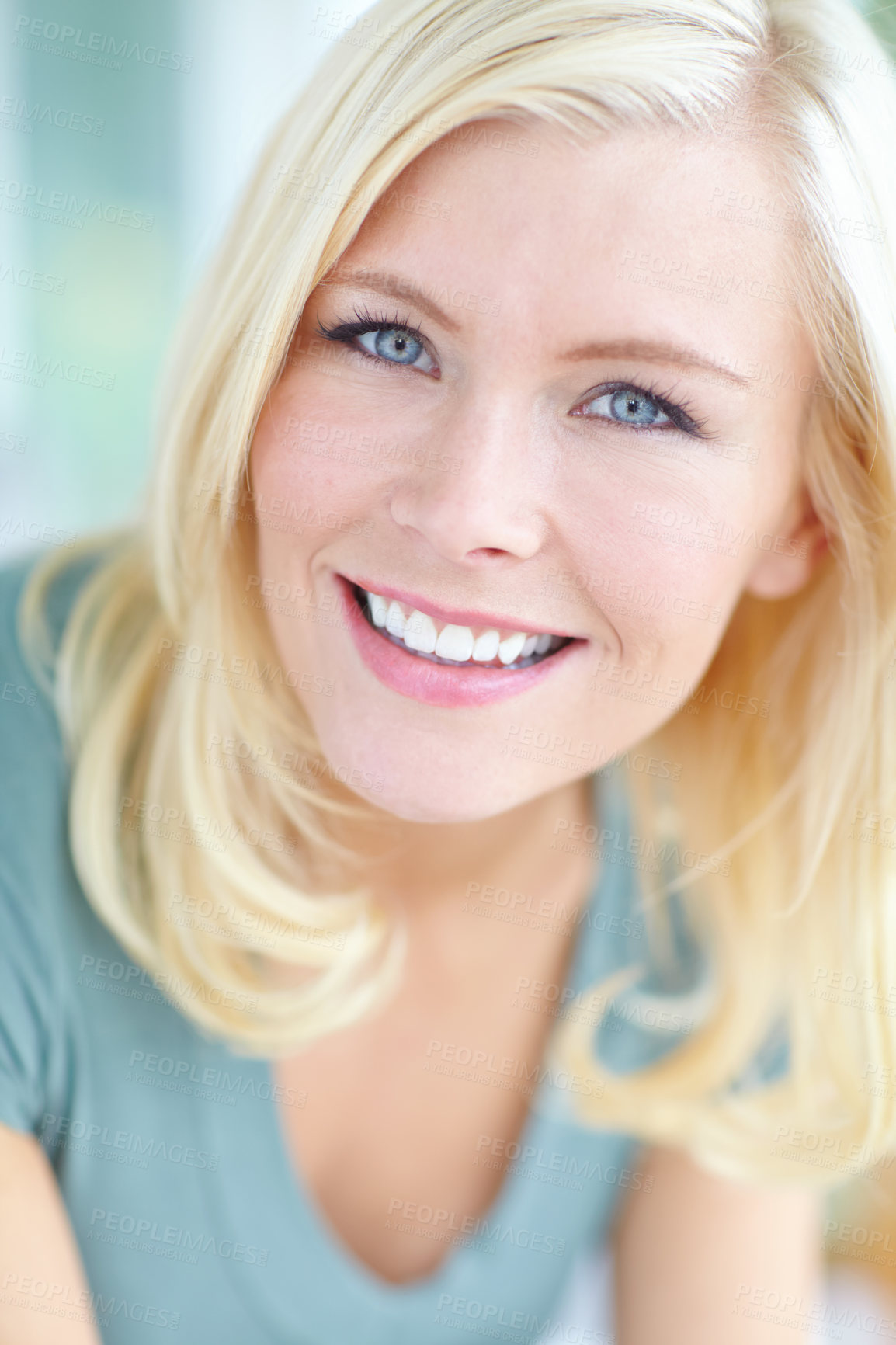 Buy stock photo Cropped portrait of a beautiful blonde woman smiling