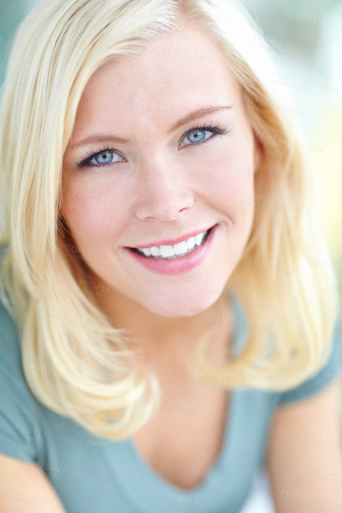 Buy stock photo Cropped portrait of a beautiful blonde woman smiling