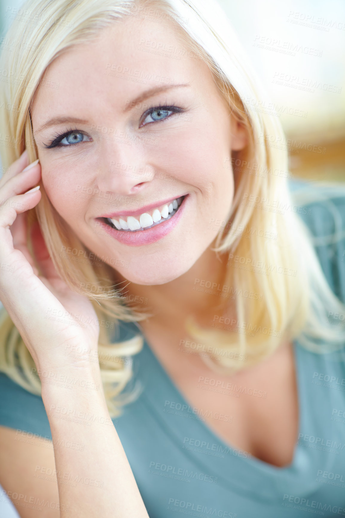 Buy stock photo Cropped portrait of a beautiful blonde woman smiling