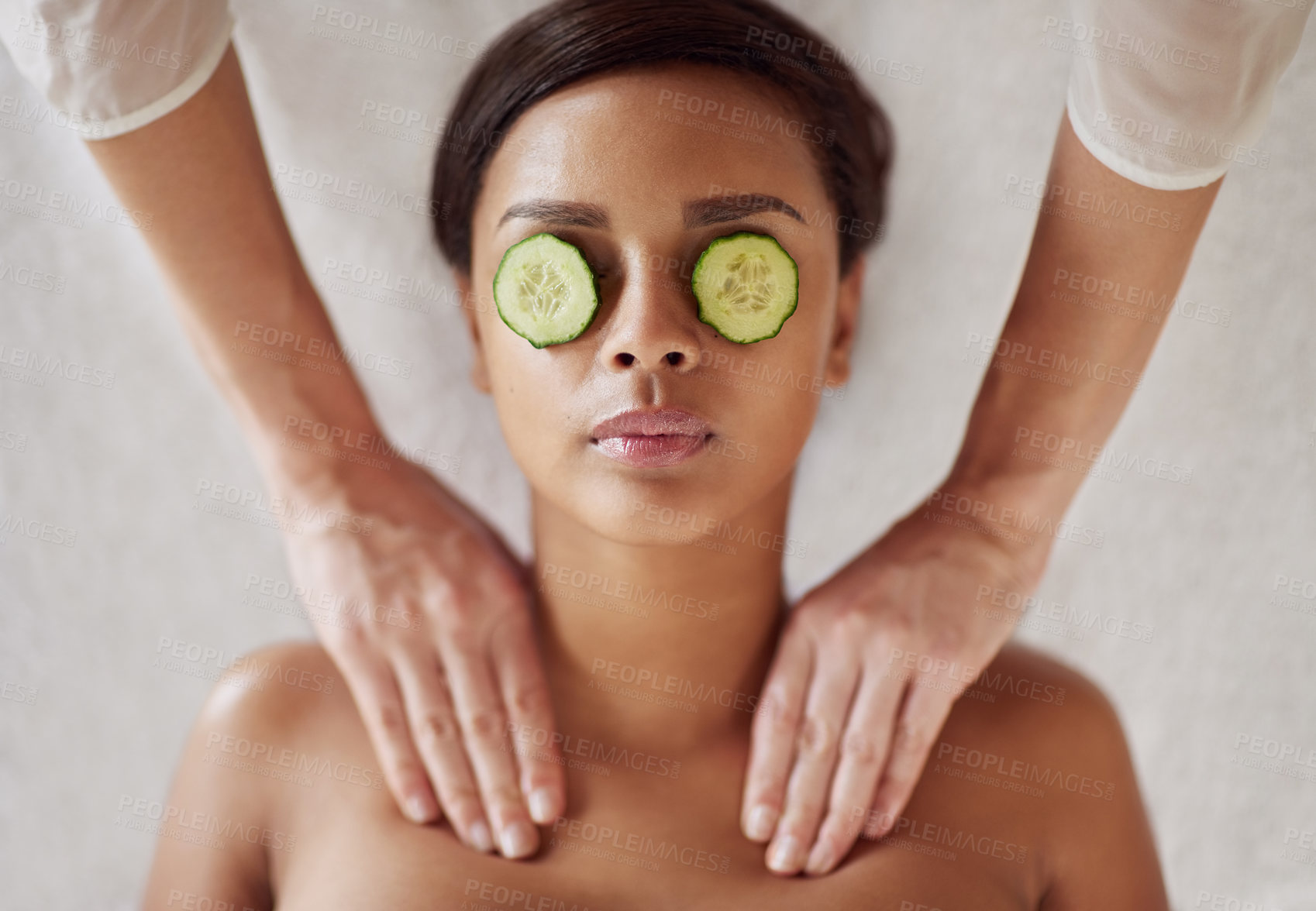 Buy stock photo Woman, spa and neck massage for relax, masseuse hands and cucumber for dark circles. Resting, stress relief and calm for cosmetic and wellness, soothing therapy and natural or luxury treatment
