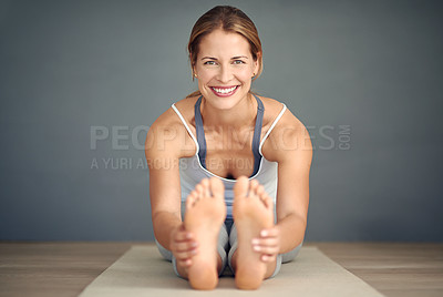 Buy stock photo Happy woman, portrait and stretching body in yoga on mat for spiritual wellness, zen or healthy workout at home. Calm female person or yogi with smile in warm up stretch or exercise with mockup space