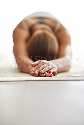 Buy stock photo Woman, hands and stretching body in yoga on floor mat for spiritual wellness, exercise or zen workout at home. Female person or yogi in warm up stretch for fitness or mental health on mockup space