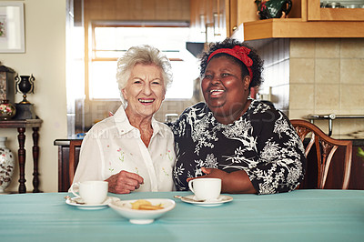 Buy stock photo Portrait of a happy senior woman having tea with her friend at home