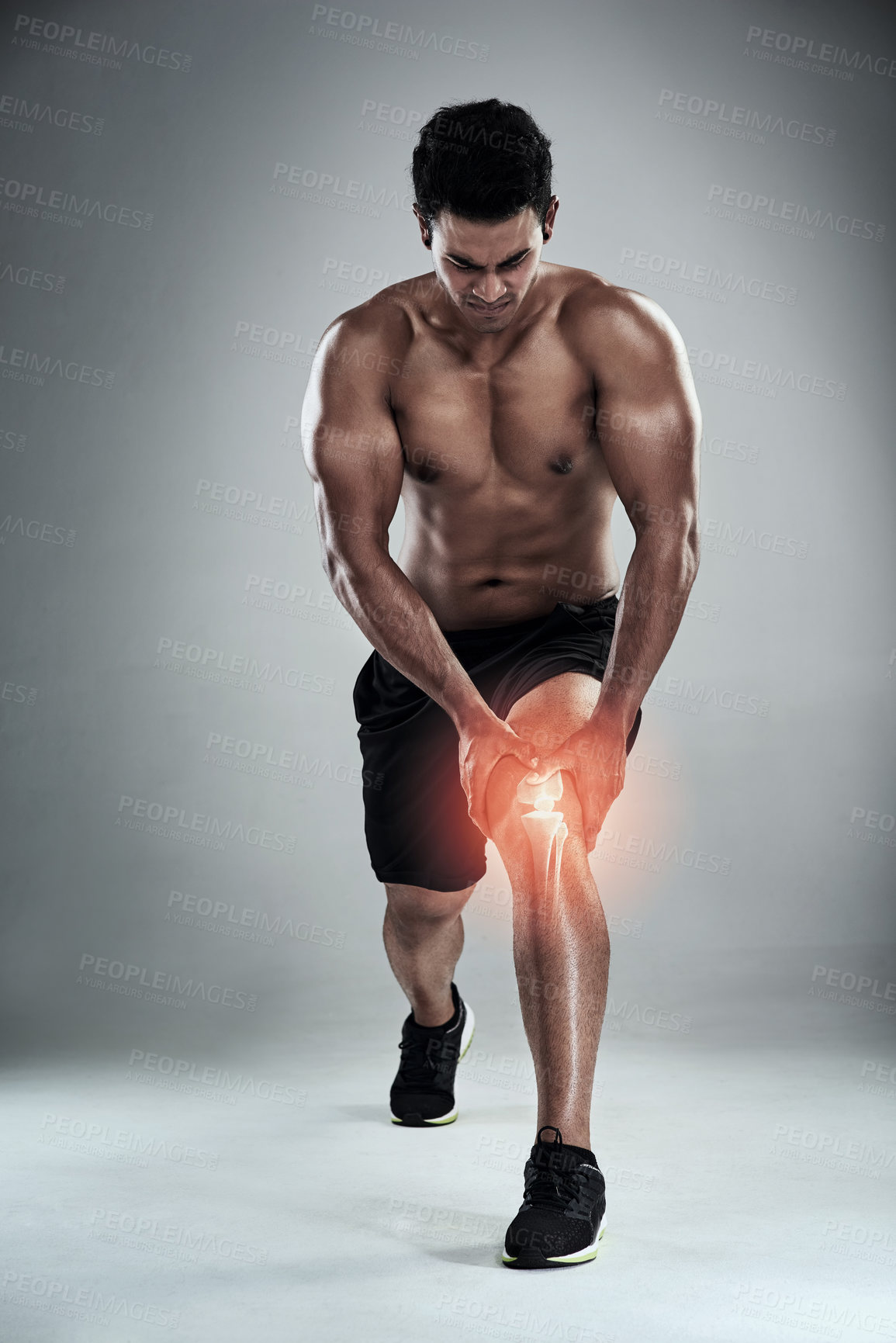 Buy stock photo Stretching, fitness and man with knee pain in studio, physio and cramp in legs at gym workout for body builder training. Exercise, risk and athlete with muscle, injury or ache on  white background