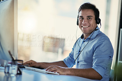 Buy stock photo Portrait of callcenter agent, smile and man consulting with advice, crm and happiness at help desk. Phone call service, conversation and happy customer support consultant working in modern office.