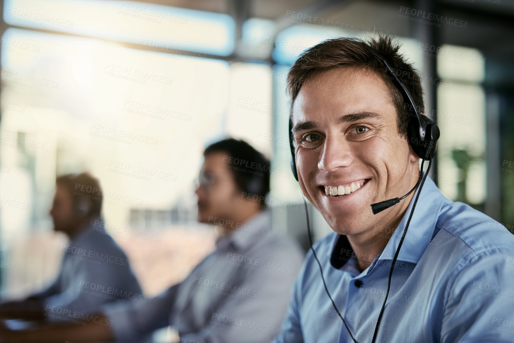 Buy stock photo Customer service, smile and mockup, portrait of happy man in coworking space consulting with advice at help desk. Phone call, conversation and happiness, callcenter consultant with headset in office.