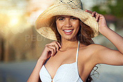 Buy stock photo Female person, beach and relax in portrait on vacation for wellness, happiness for summer in Mauritius. Woman, smile and hat in hand for sun protection in outdoor, island adventure or holiday travel