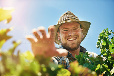 Buy stock photo Shot of a farmer out harvesting