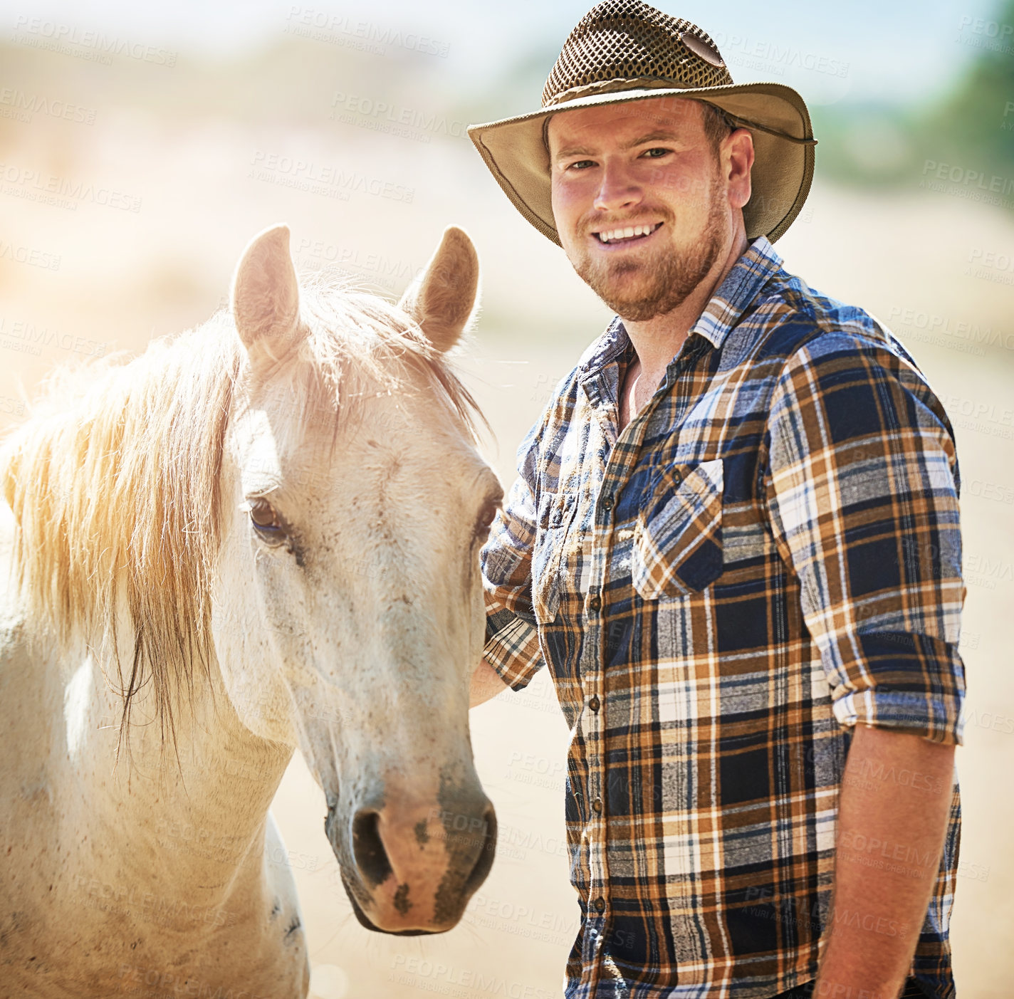 Buy stock photo Portrait, farmer and man with horse, cowboy and sunshine with environment, happiness and smile. Summer, person and outdoor with guy, animal and equestrian with break, countryside and pet with ranch